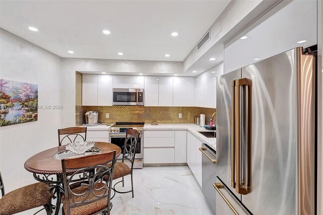 Building Photo - 9801 Collins Ave