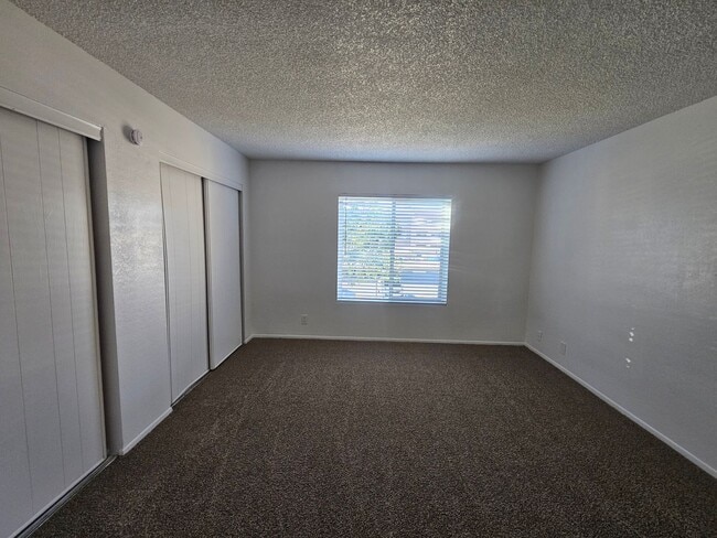 Building Photo - Dobson and University- 2 bedroom condo- full size w/d