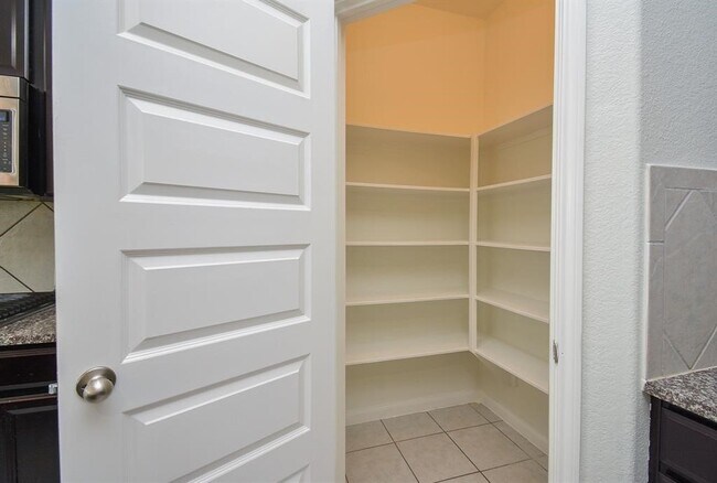 Building Photo - 22211 Weller Oaks Dr