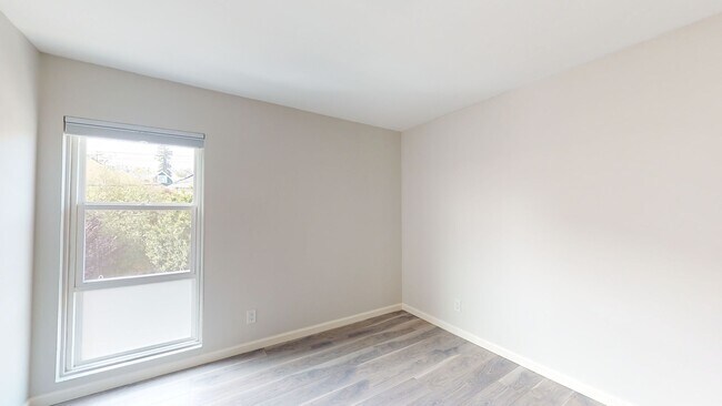 Building Photo - Remodeled modern 1 bedroom end unit, close...