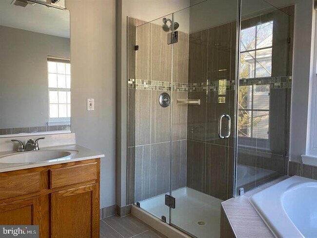 Building Photo - Impressive Three-Bedroom Townhome in North...