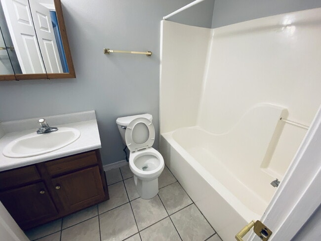 Building Photo - Fantastic location! This end unit offers t...