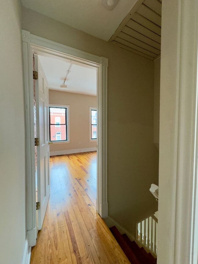 Building Photo - Charming 2 Bedroom/1 Bathroom Townhome with Deck and Parking Pad in South Baltimore!