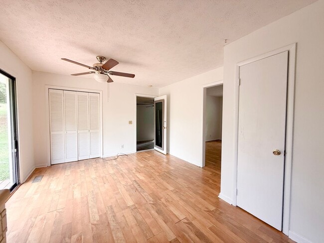 Building Photo - 2-Bedroom Home with Bonus Room & Large Wooden Deck | Pet-Friendly Near I-40 & City Lake