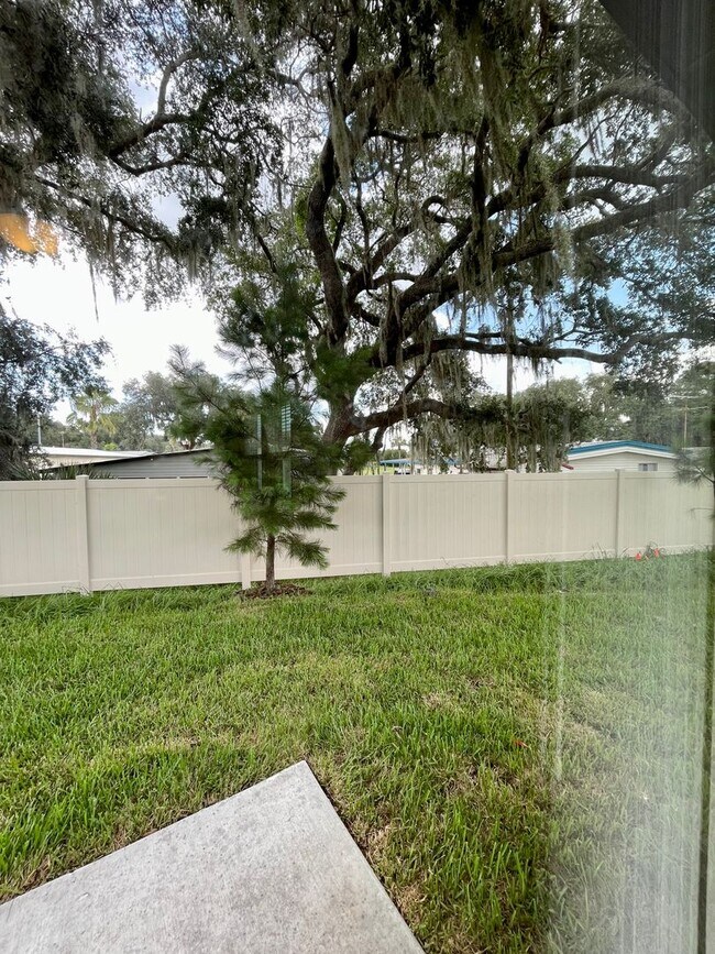 Building Photo - Available NOW! VERY well maintained 4/2 in Monroe Meadows / Wesley Chapel!