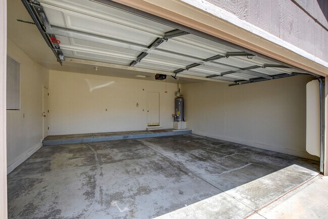 Building Photo - Three bedroom, two bath, two car garage in...