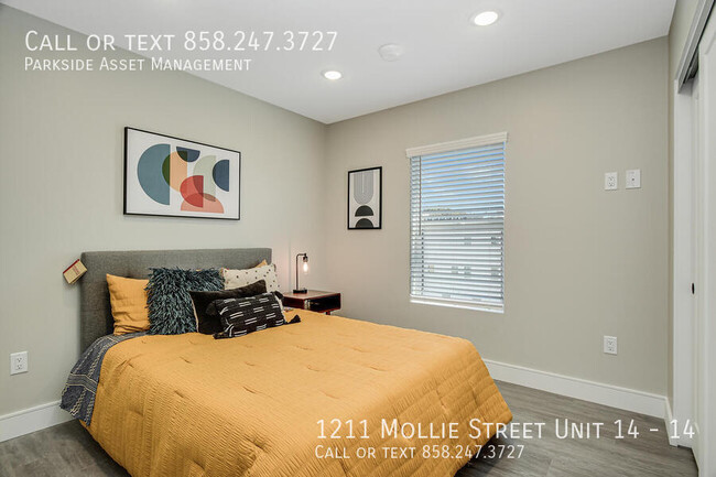 Building Photo - $1,000 Move-in Credit! The Carl on Lauretta