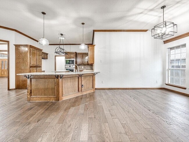 Building Photo - 4 Bedrooms - 3 Bathrooms - 3 Car Garage - ...