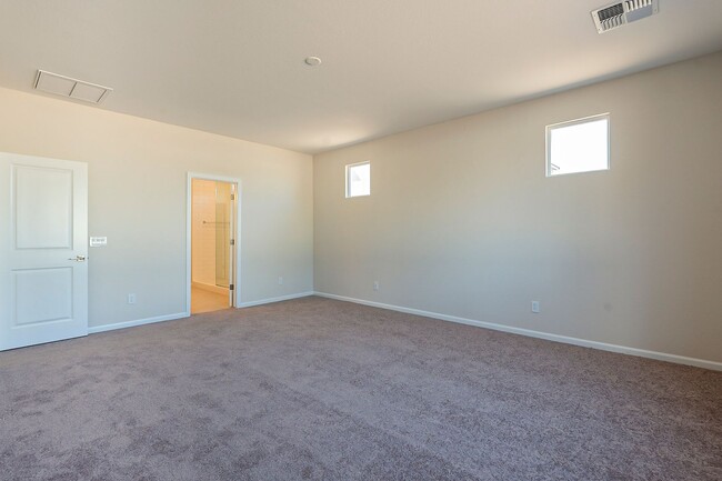 Building Photo - Beautiful New Spacious Home Includes 3 car...