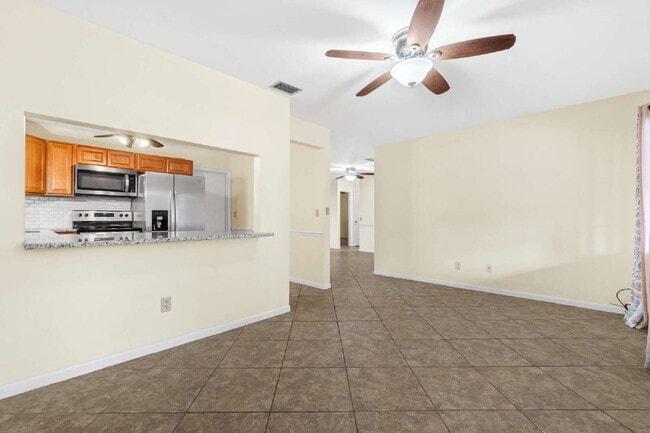 Building Photo - 2BR 2BA Villa Available Now On Top of the Word!