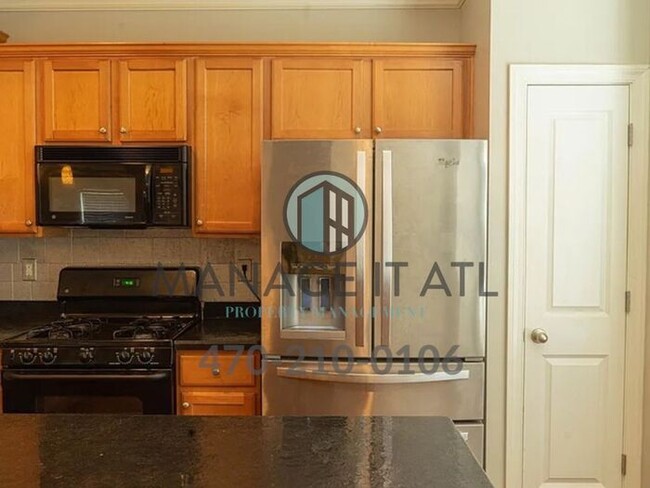 Building Photo - Modern 3 Bedroom Townhome in Peachtree Cor...