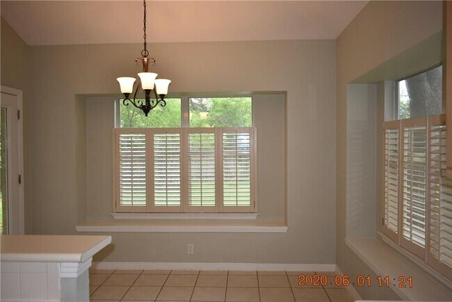 Building Photo - 10016 Liriope Cove