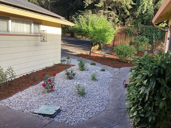 Building Photo - Look No Further, this home has it all- Hot Tub, Sauna, EV Charger, Solar, KOI Pond & More