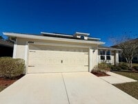 Building Photo - Room to Live, Space to Thrive! Stunning 6BR Home with Solar, Upgrades & Screened Lanai in Macclen...