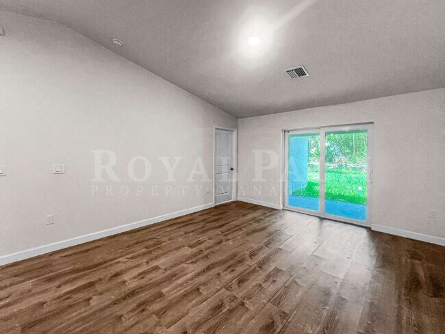 Building Photo - Spacious 3BR/2BA Duplex in Lehigh Acres & $500 Off Your First Month If You Apply by Aug 20th!