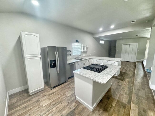 Building Photo - Move-In Special: 1 Month Rent Concession on a 14-Month Lease!