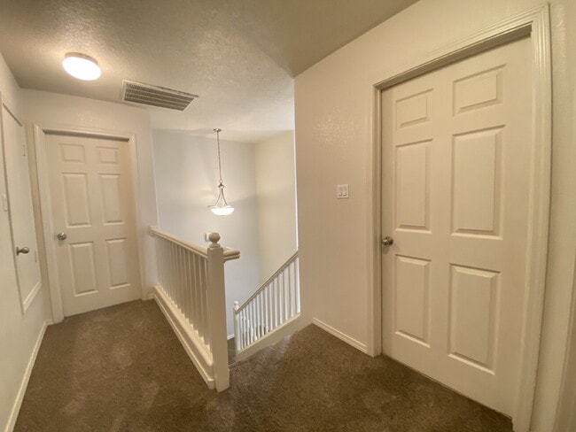 Building Photo - GATED COMMUNITY - 2 Story Townhouse - All BR Upper Level