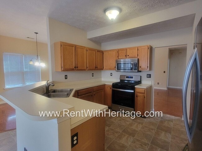 Building Photo - WOW!!...GORGEOUS HOME/HARDWOOD FLOORS/ UPGRADES GALLORE / SWIM - TENNIS