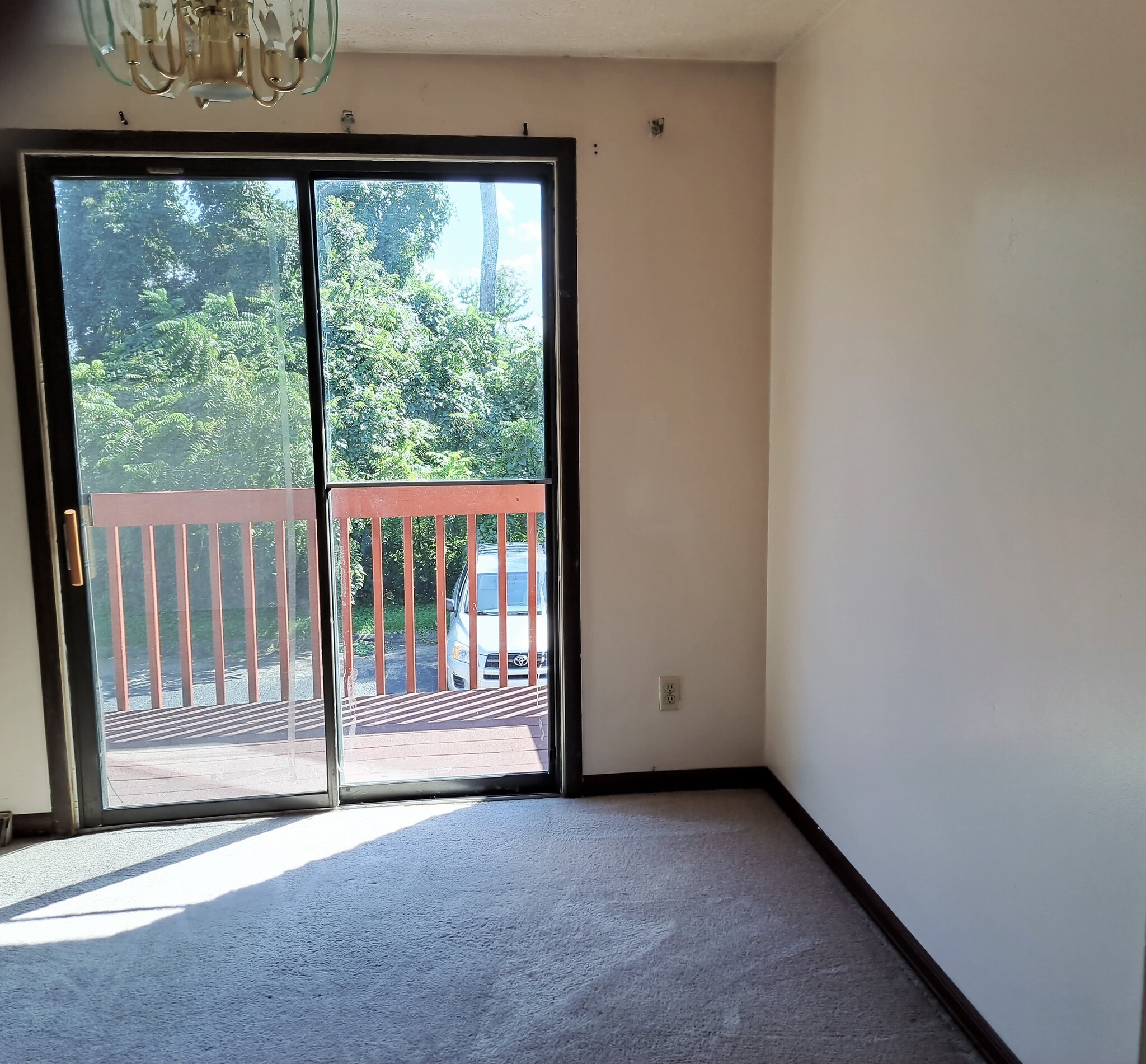 Dining area with view of private deck and additional parking for second car and guest cars - 3812 Lebanon Church Rd