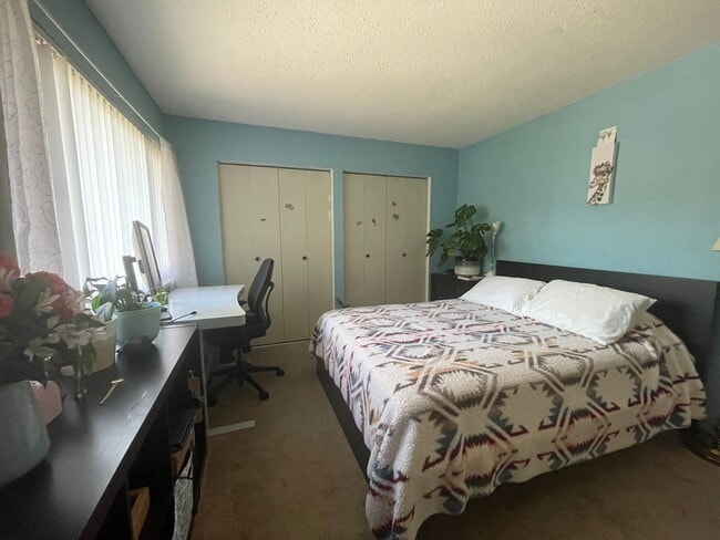 Building Photo - Step into a beautifully refreshed 3-bedroom, 1.5-bath condo that blends comfort, style, and unbea...