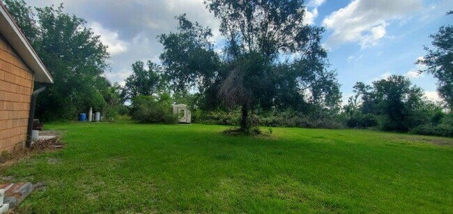 Building Photo - 5620 Sabal Palm Ln