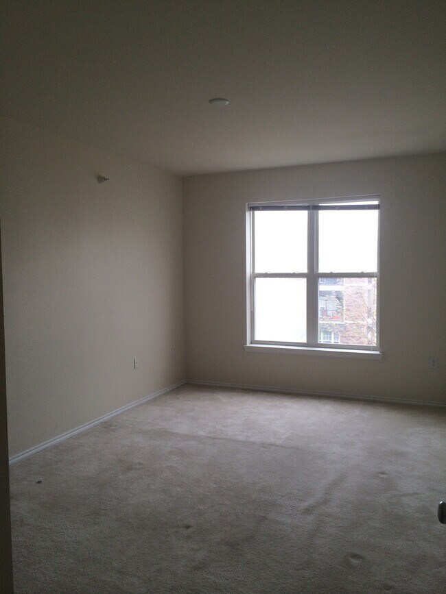 Building Photo - Modern 2-Bedroom in Eden Prairie with Heated Parking and Resort-Style Amenities