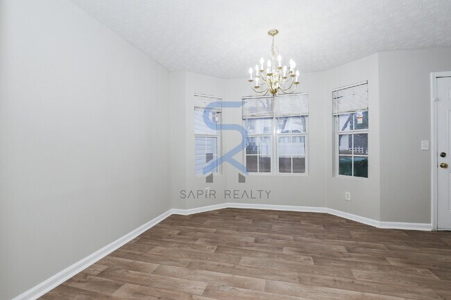 Building Photo - Move in before January 31st and choose your reward: a $250 Amazon Gift Card or a 55" Smart TV!