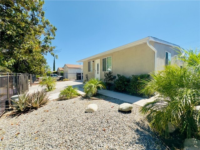 Building Photo - 8657 Ranchito Ave