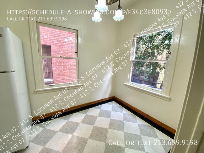 Building Photo - NO SECURITY DEPOSIT- Large Charming 1 Bedr...