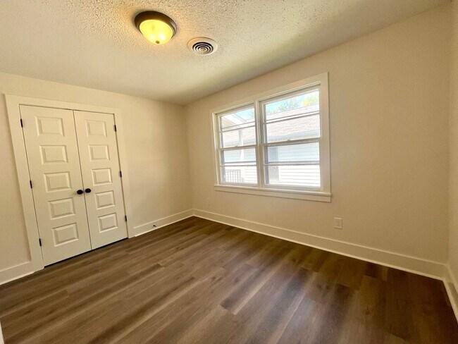 Building Photo - Fully Renovated 3BR/1.5BA – Prime Location + Lawn Care Included