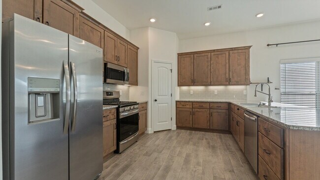 Building Photo - "Charming 3-Bed Oasis with Granite Touches & Cozy Fireplace in Bentonville!"