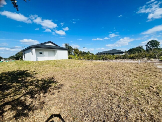 Building Photo - Brand-New 2BR/2BA Home with Lanai on Oversized Lot – Desirable SW Lehigh Acres