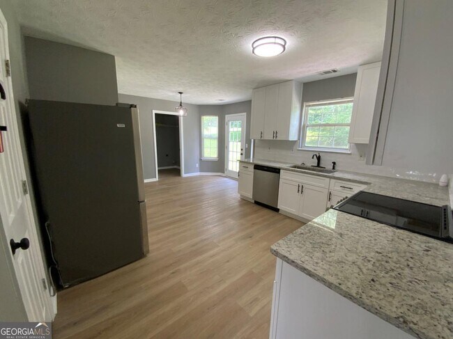 Building Photo - 6506 Chestnut Lake Crossing