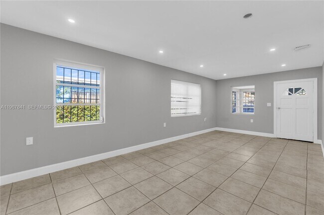 Building Photo - 6940 NW 6th Ct