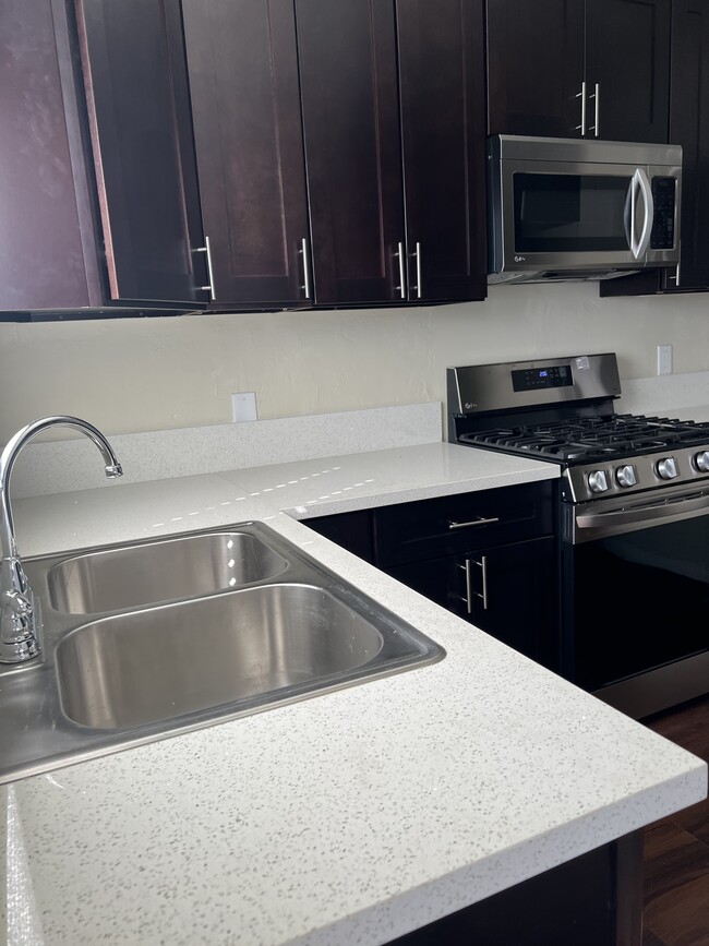 New stainless steel sink & faucet - 14812 Magnolia Blvd