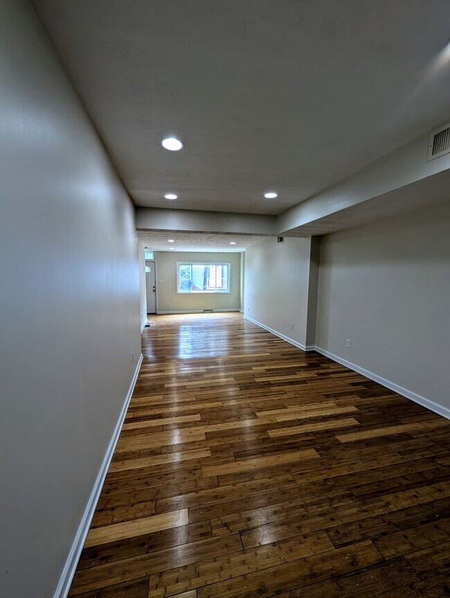 Building Photo - Large 3 Bedroom on a quiet street with Off Street Parking