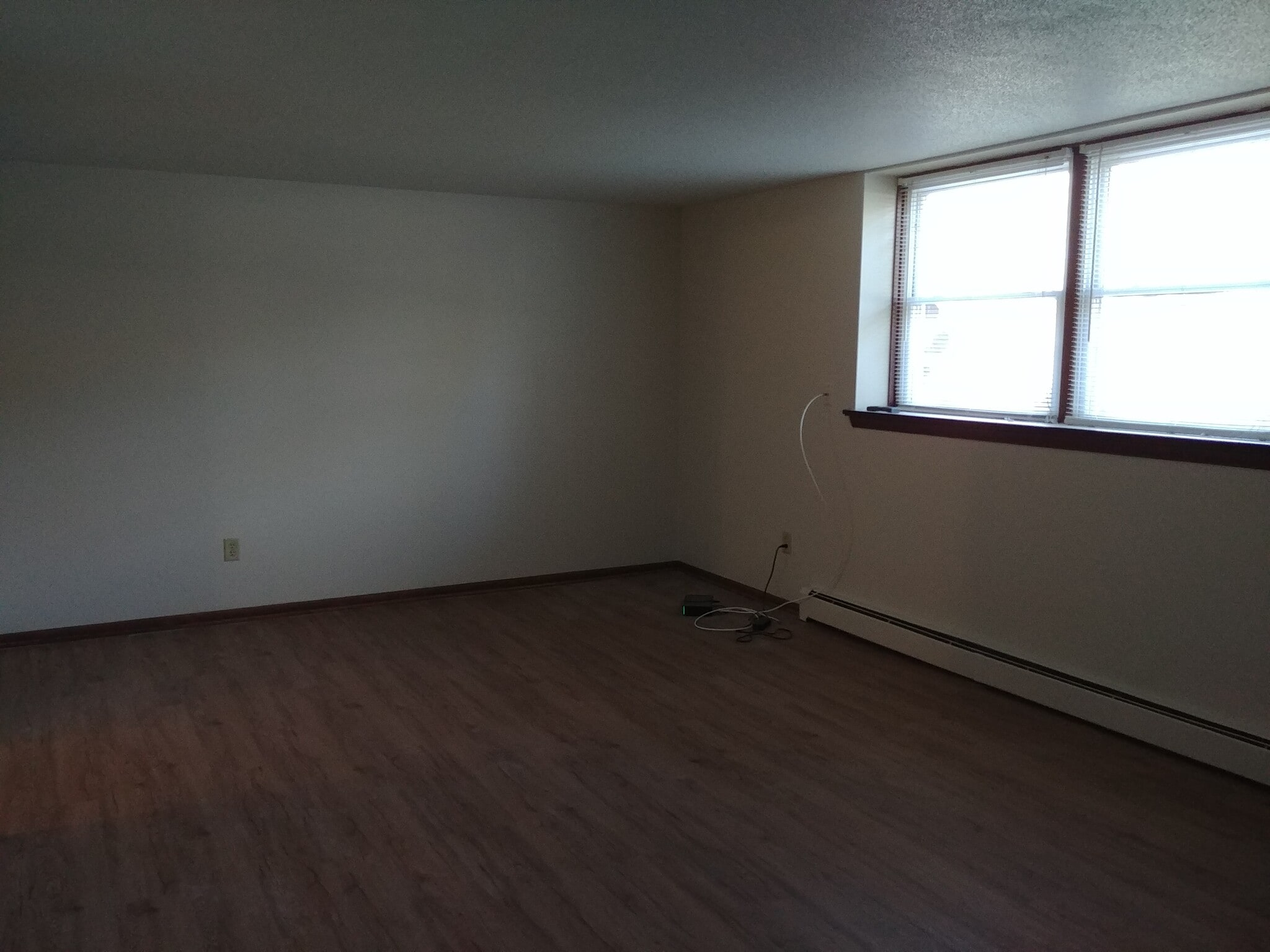 Living room with north facing windows - 92 Logan Ave W