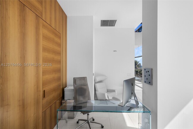 Building Photo - 5875 Collins Ave