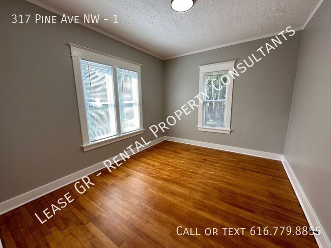 Building Photo - Updated lower 2 bedroom on the West side o...