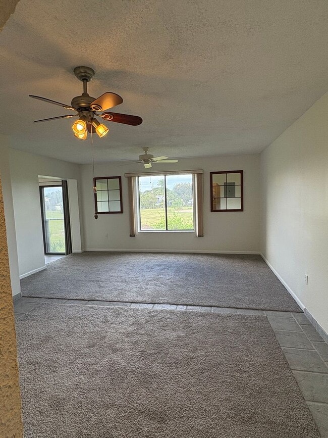 Building Photo - (55+) 2/2 Condo in the Peaceful Miles Grant Golf Course Community