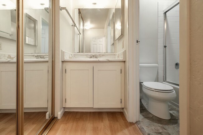 Building Photo - Peaceful Forest-View Condo with Fireplace & Private Balcony in Golden Oaks