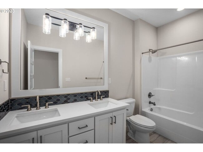 Building Photo - Beautiful 4 Bedroom + Office Home with Open Layout, Gourmet Kitchen & Large Entertainment Room