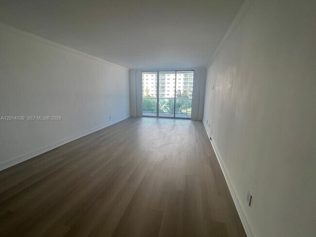 Building Photo - 19390 Collins Ave