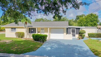 Building Photo - Beautiful 2/2 ~1000Sq. Ft. with NEW floors...