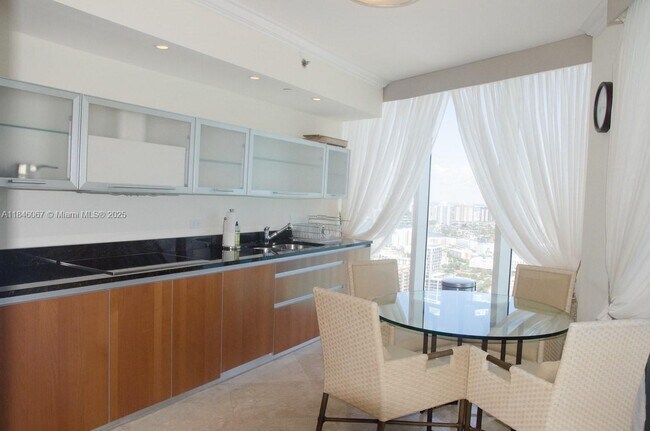 Building Photo - 17201 Collins Ave
