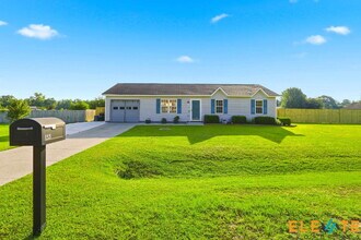 Building Photo - Beautiful Like-New 3 Bedroom Home with Huge Fenced Yard, Greenhouse & Storage