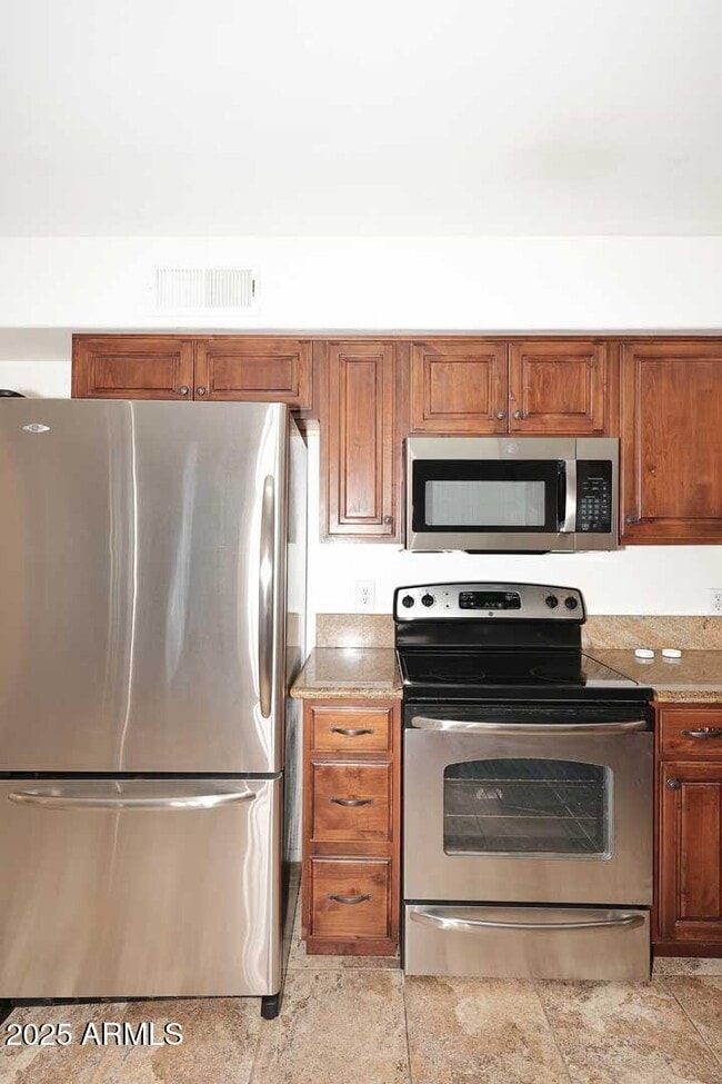 Building Photo - 7910 E Camelback Rd