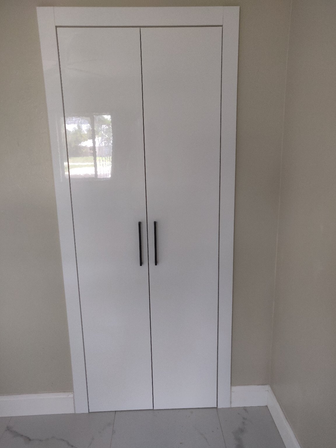 Guest closet doors - 9160 Aster Rd