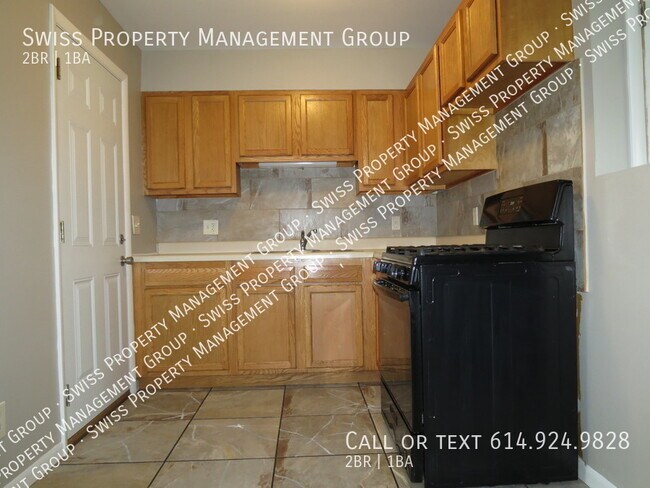Building Photo - A Charming 2-Bedroom Apartment with Baseme...
