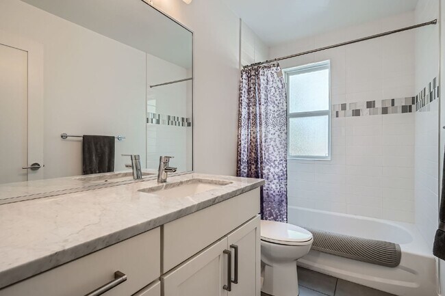 Building Photo - Available NOW! SIX MONTH LEASE - Spacious 3-Bedroom Townhouse with 3.5 Baths in Vibrant Sloans Lake!